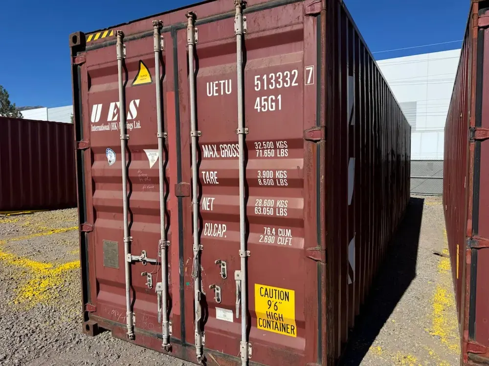 A row of used shipping containers standing in the Tactical Container yard in Reno